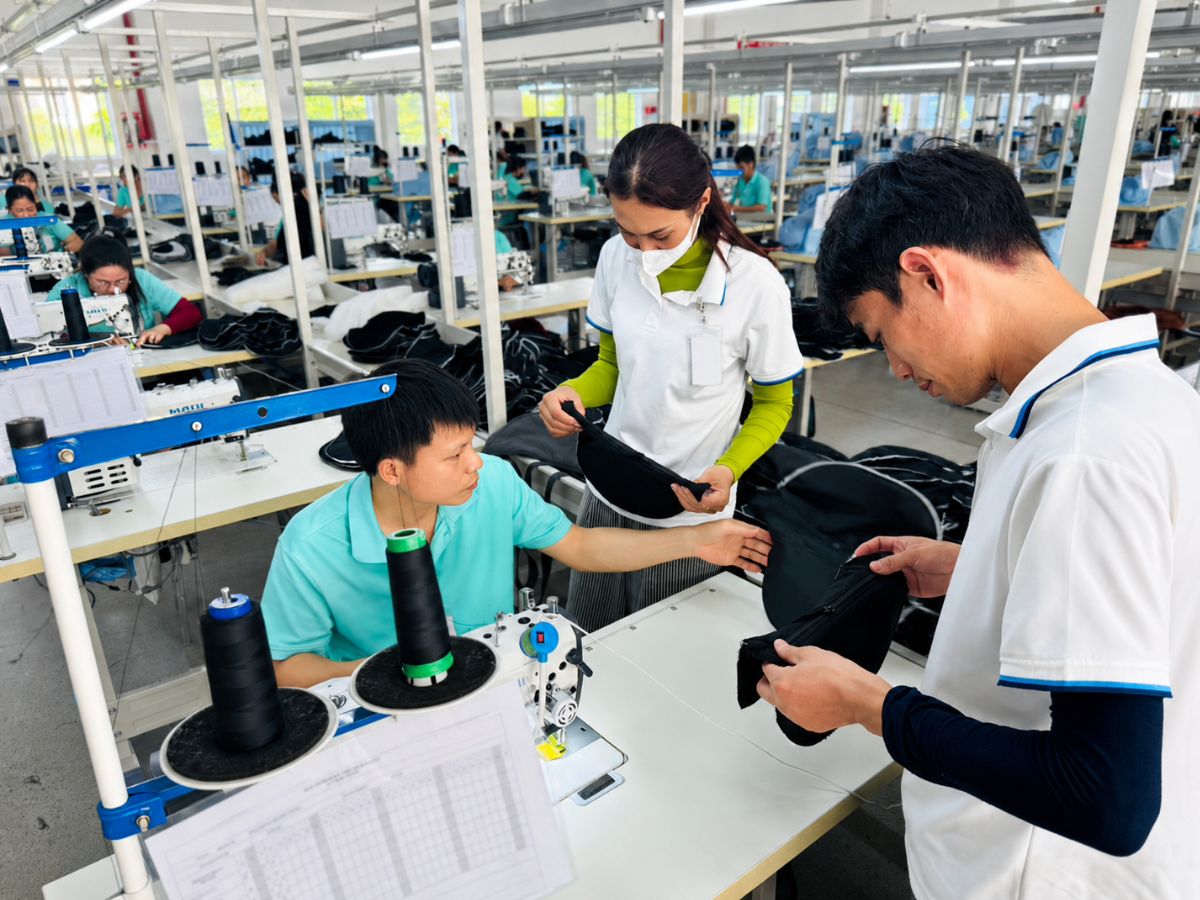 Vietnam team reviewing product samples